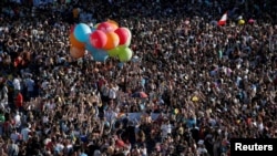 Hundreds of thousands of people attend the World Pride parade in Madrid, Spain, July 1, 2017. The 10-day festival highlighting gay rights ends Sunday.