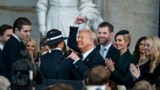 President Donald J. Trump celebrates with family after being sworn in as the 47th president of the United States takes place inside the Capitol Rotunda of the U.S. Capitol building in Washington, Jan. 20, 2025. 