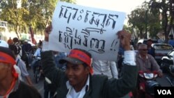 Supporters of the opposition Cambodia National Rescue Party rode motor scooters through Phnom Penh, many adorned with placards that called for Prime Minister Hun Sen to step down.