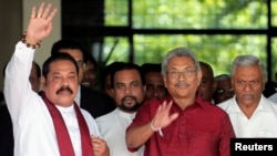 Gotabaya Rajapaksa, Sri Lanka People's Front party presidential election candidate and former wartime defence chief, with his brothers, Mahinda Rajapaksa, former president and opposition leader and Chamal Rajapaksa (R) are seen as they leave after…