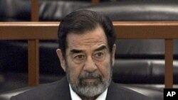 Saddam Hussein em tribunal a 6 de Dezembro de 2006. Bagdad, Iraque.