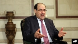 FILE - Nouri al-Maliki is seen in a Feb. 2, 2015, photo.