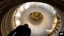 The Rotunda of the US Capitol is partially covered during renovations as Congress returns for the lame duck session following a sweep for the GOP in the midterm elections.