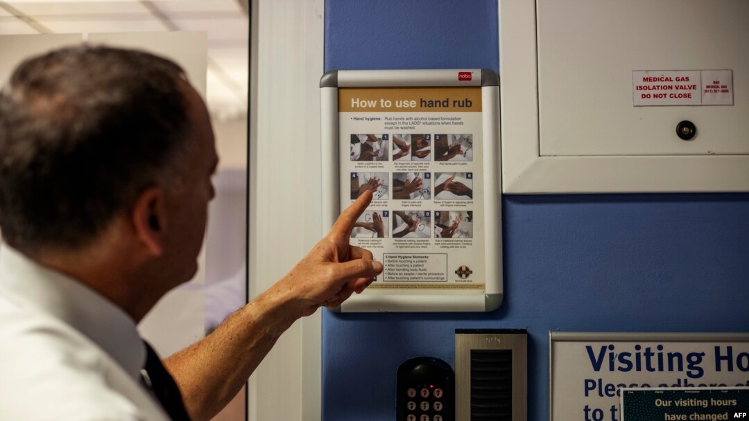 Doctor and Netcare Group Chief Executive Officer Richard Friedland explains how to wash hands at the Netcare Sunninghill Hospital in Johannesburg, March 12, 2020.
