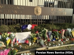 A memorial to victims of the coordinated terrorist attacks in Paris Friday grows outside the French Embassy in Washington, D.C., Nov. 14, 2015.