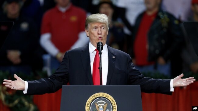 President Donald Trump speaks during a rally in Pensacola, Fla., Dec. 8, 2017.