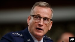 FILE - In this April 17, 2018 file photo, Air Force Gen. Terrence O'Shaughnessy testifies during a Senate Armed Services Committee hearing on Capitol Hill in Washington. 