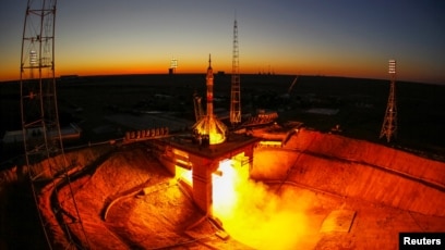 A Picture and Its Story - Spacecraft Blast Off on Edge of Day and