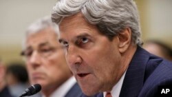 Secretary of State John Kerry, accompanied by Defense Secretary Chuck Hagel, left, testifies on Capitol Hill, Sept. 4, 2013, before the House Foreign Affairs Committee.