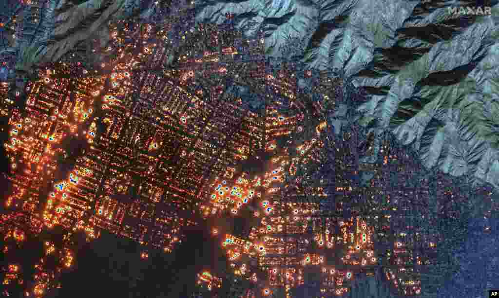 This satellite image provided by Maxar Technologies shows the Eaton Fire, Jan. 8, 2025, in Altadena, California.