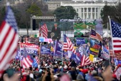 FILE - With the White House in the background, former President Donald Trump speaks his supporters during a rally in Washington, D.C., Jan. 6, 2021.