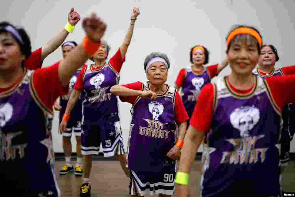 Wang-Chen Bi-Jin, 91, a member of the &quot;Six Carat&quot; elderly Hip Hop dance group, reacts during dress rehearsal in Taichung, Taiwan.