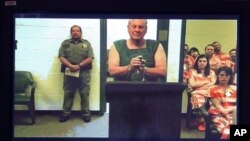 Curtis Reeves appears via video conference before Circuit Judge Lynn Tepper in Wesley Chapel, Fla. on Tuesday, Jan. 14, 2014. Tepper ordered Reeves, 71, held without bond on a charge of second-degree murder in the death of 43-year-old Chad Oulson on Mon