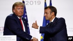 El presidente de Francia, Emmanuela Macron y el presidente de Estados Unidos, Donald Trump, durante la última cumbre del G7 en Biarritz, Francia. 