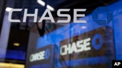FILE - JPMorgan Chase revealed during the first week of October 2014 that 76 million households were affected by a cyberattack against the bank.