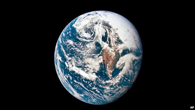FILE - This May 18, 1969 photo made available by NASA shows Earth from 36,000 nautical miles away as photographed from the Apollo 10 spacecraft.