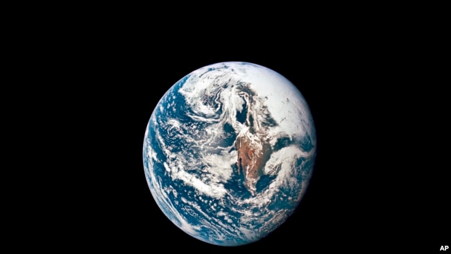 FILE - This May 18, 1969 photo made available by NASA shows Earth from 36,000 nautical miles away as photographed from the Apollo 10 spacecraft during its trans-lunar journey toward the moon.
