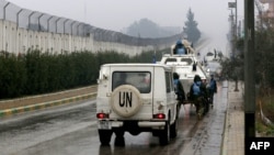 United Nations Interim Force in Lebanon vehicles patrol along the border with Israel near the southern Lebanese village of Kfar Kila on Dec. 6, 2018. Israel announced on Dec. 4 that it had discovered Hezbollah tunnels.