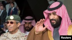 Saudi Arabia's Crown Prince Mohammed bin Salman gestures during the graduation ceremony of the 93rd batch of the cadets of King Faisal Air Academy, in Riyadh, Feb. 21, 2018. 