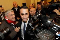 FILE - 5-Star Movement's leader Luigi Di Maio arrives for a press conference on the preliminary election results, in Rome, March 5, 2018.