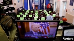 白宫新闻简报室电视屏幕上播放的特朗普总统讲话。(2021年1月19日)