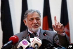 Ahmad Yusof Nurestani, chairman of the Independent Election Commission, speaks during a press conference in Kabul, Afghanistan, July 7, 2014.