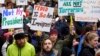 Trump Defends Travel Ban Despite Protests, Legal Action