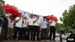 FILE: Ath Thun, president of the Coalition of Cambodia Apparel Workers gives a speech at a mass gathering to celebrate the 133rd Labor Day at riverside park in Phnom Penh, Cambodia, May 1, 2019. (Malis Tum/VOA Khmer)