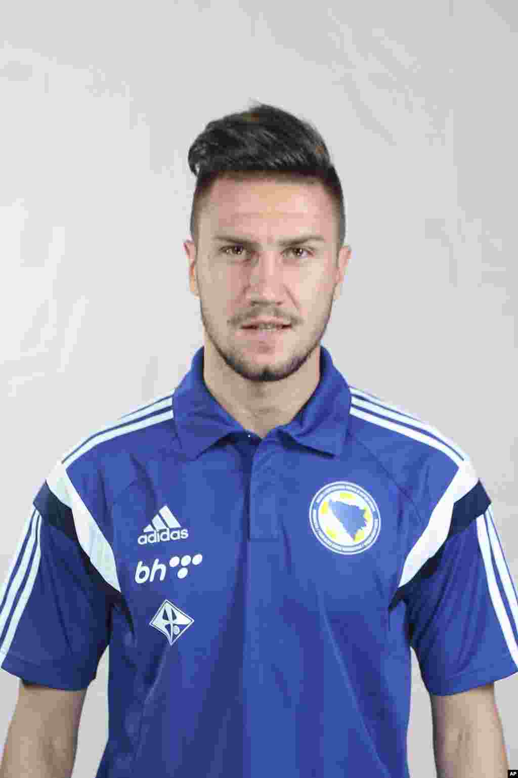 Bosnian national soccer player Ermin Bicakcic poses for a picture during a photo session in Sarajevo May 24, 2014. The Bosnian squad will face Argentina, Iran and Nigeria in Group F of the 2014 World Cup finals in Brazil. Picture taken May 24, 2014. REUTERS