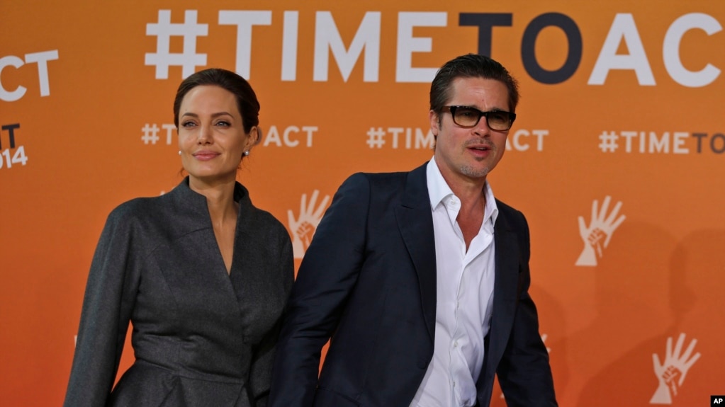 Angelina Jolie và Brad Pitt tại một sự kiện vào tháng 6/2014.