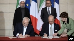 France Iran Javad Zarif Hassan Rouhani Francois Hollande Laurent Fabius