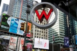 FILE - The logo for the W Hotel, owned by Starwood Hotels & Resorts Worldwide, in New York's Times Square, July 31, 2013. The information of as many as 500 million guests at Starwood hotels has been compromised.