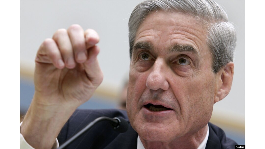 FILE - Robert Mueller, as FBI director, testifies before the House Judiciary Committee hearing on Federal Bureau of Investigation oversight on Capitol Hill in Washington, June 13, 2013.