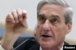 FILE - Robert Mueller, as FBI director, testifies before the House Judiciary Committee hearing on Federal Bureau of Investigation oversight on Capitol Hill in Washington, June 13, 2013.