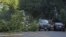 A fallen tree blocks one lane of traffic on 13th Street NW in the Logan Circle neighborhood of Washington, Saturday, June 30, 2012.