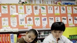 5-year-old students Perla Ortiz, left, and Yahir Perez at a bilingual school in Mesquite, Texas last month