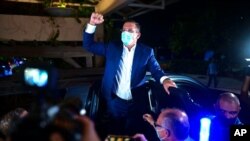 FILE - Then-candidate Pedro Pierluisi arrives at Vivo Beach Club to celebrate a slim lead of his pro-statehood party in the Puerto Rican general elections, in Carolina, Puerto Rico, Nov. 3, 2020. Pierluisi was sworn in as governor Jan. 2, 2021.