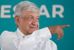FILE - Mexico's President Andres Manuel Lopez Obrador gestures during an official event in Sabinas, in Coahuila state, Mexico, May 4, 2019.