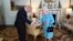 FILE - Britain's Queen Elizabeth II welcomes Boris Johnson, then newly-elected leader of the Conservative party, during an audience at Buckingham Palace, London, England, July 24, 2019.