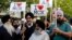Members of the Manchester Sikh Community attend a vigil in Albert Square, Manchester, England, May 23, 2017, the day after the suicide attack at an Ariana Grande concert that left 22 people dead as it ended on Monday night.