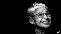 In this November 28, 1999 file photo, Rosa Parks smiles during a ceremony where she received the Congressional Medal of Freedom in Detroit.