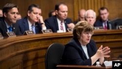 Phoenix prosecutor Rachel Mitchell questions Christine Blasey Ford as Senators, from left, Sen. Ben Sasse, R-Neb., Sen. Ted Cruz, R-Texas, Sen. Mike Lee, R-Utah., and Sen. John Cornyn, R-Texas, listen during the Senate Judiciary Committee hearing, Thursday, Sept. 27, 2018.