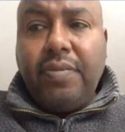 Negasi Kibrom is isolated at home in Milan, Italy, infected with COVID-19. He relies on his teenage daughters for care. (Facebook Live screen grab)
