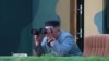 North Korean leader Kim Jong Un watches the test-fire of two short-range ballistic missiles Thursday, in this undated picture released by North Korea's Central News Agency, July 26, 2019. 