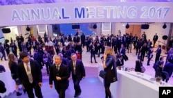 FILE - Guests attend the World Economic Forum in Davos, Switzerland, Jan. 17, 2017.