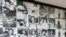 A tourist walks past photos of former prisoners displayed at Tuol Sleng genocide museum, a former Khmer Rouge prison known as S-21, in Phnom Penh.