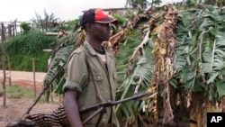 un rebelle rwandais non identifié à 20 km de Masisi