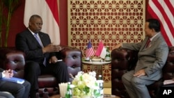 FILE - U.S. Secretary of Defense Lloyd Austin, left, talks with Indonesia's Defense Minister Prabowo Subianto during their bilateral gathering  connected  the sidelines of the ASEAN Defense Ministers' Meeting Plus successful  Jakarta, Indonesia, Nov. 16, 2023.