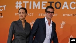 Angelina Jolie và Brad Pitt tại một sự kiện vào tháng 6/2014.