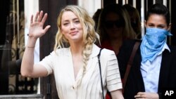 Amber Heard arrives at the High Court, in London, July 20, 2020. 